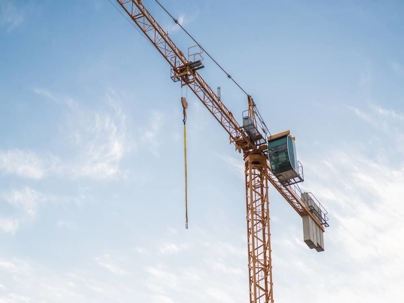 a crane against a blue sky